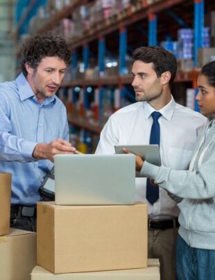 warehouse-manager-worker-discussing-with-laptop (Representational Image)