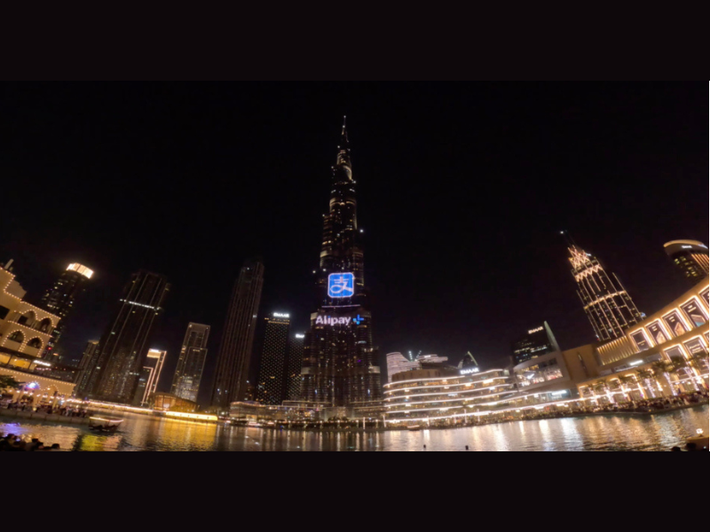 With the debut treat unveiled in Dubai, a group of lucky e-wallet users would win round-trip flights in Dubai to find out the poems they submitted through an earlier Alipay+ social media campaign are projected onto the Burj Khalifa to light up the sky. (Photo: Business Wire)