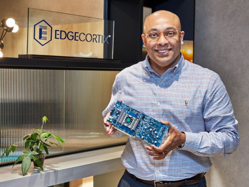 EdgeCortix Founder and CEO Dr. Sakyasingha Dasgupta holds a board equipped with the company's proprietary SAKURA-I AI Processor