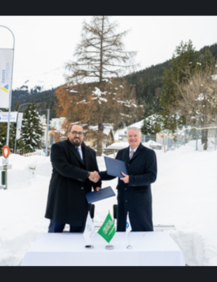 Saudi Arabia’s Minister of Economy and Planning, HE Faisal F. Alibrahim, signs agreement with OECD Secretary-General Mathias Cormann to expand cooperation between Saudi Arabia and the OECD, at the World Economic Forum Annual Meeting 2024 in Davos, Switzerland. (Photo: AETOSWire)