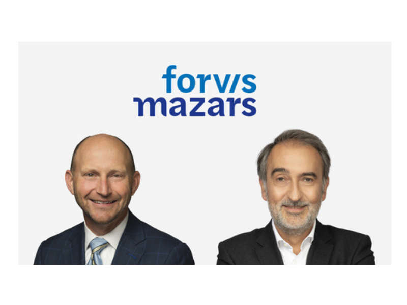 Tom Watson (left) and Hervé Hélias of Forvis Mazars.