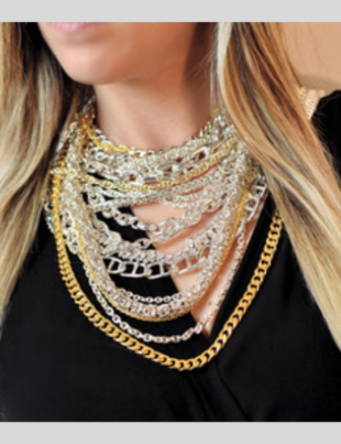 Ren Jord 999 Pure Silver and 24K Pure Gold Chains on a female model (Photo Courtesy: PRNewswire)