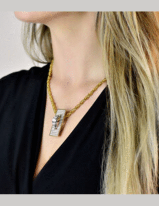 Ring-Out Pendant Displayed on Model (Image Courtesy: PRNewswire)