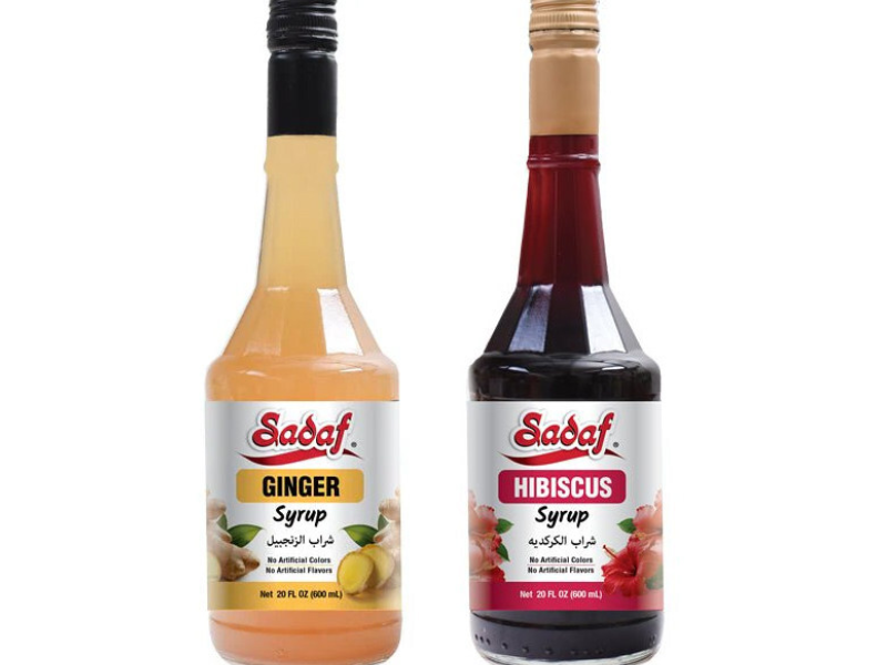 Sadaf Foods announces two new additions to the company's 1,500+ product line: tart, fruity Hibiscus Syrup and bold, warming Ginger Syrup. Whether you're crafting a traditional recipe or providing a modern take on a classic, these syrups have you covered. Both add significant depth and delicious flavor to cocktails, mocktails, marinades, teas, and baked goods (Image Courtesy: PRNewswire)