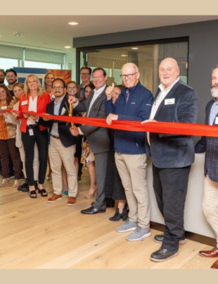 Gresham Smith's Detroit office leaders and employees celebrate their open house with an official ribbon cutting (Image Courtesy: PRNewswire)