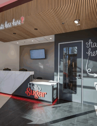 The Hello Sugar experience: a modern, inviting environment designed for comfort and confidence. Hello Sugar offers expert waxing, sugar waxing, and laser hair-removal services nationwide (Image Courtesy: PRNewswire)