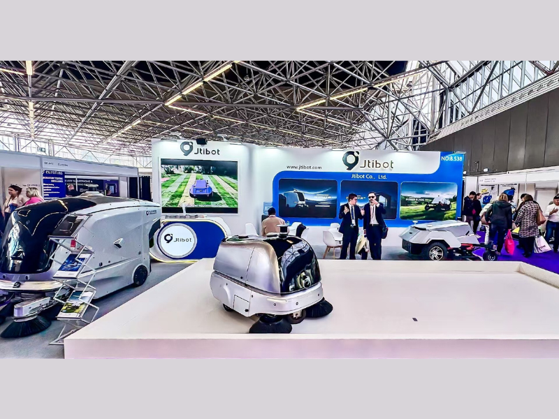 Jtibot showcases its autonomous outdoor sweepers at Interclean Amsterdam 2026, with attendees exploring the company's booth featuring AI-driven cleaning solutions for large-scale environments (Image Credit: PRNewswire)