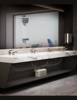 Chicago Faucets designs for efficiency in high-traffic environments like airports with the E-Tronic 80 Touchless Faucet and matching E-Tronic 80 automatic soap dispensers supplied by SoapBank, a multi-feed soap dispensing system. This latest innovation pairs reliable electronic faucet powered by 15-year long-life faucet battery supply with a large, centralized soap reservoir—reducing maintenance time, minimizing refills, and keeping airport restrooms running smoothly (Image Credit: PRNewswire