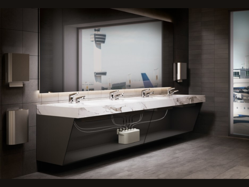 Chicago Faucets designs for efficiency in high-traffic environments like airports with the E-Tronic 80 Touchless Faucet and matching E-Tronic 80 automatic soap dispensers supplied by SoapBank, a multi-feed soap dispensing system. This latest innovation pairs reliable electronic faucet powered by 15-year long-life faucet battery supply with a large, centralized soap reservoir—reducing maintenance time, minimizing refills, and keeping airport restrooms running smoothly (Image Credit: PRNewswire