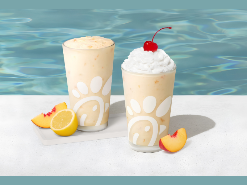 The Peach Milkshake and Peach Frosted Lemonade return to menus nationwide for a limited time (Image Credit: PRNewswire)