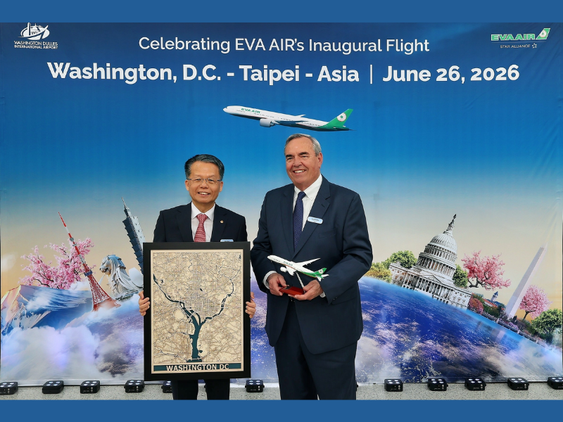 Clay Sun, President of EVA Air (left), and John E. (Jack) Potter, President and CEO of MWAA (right), exchange gifts during the ceremony at Washington Dulles International Airport (Image Credit: PRNewswire)