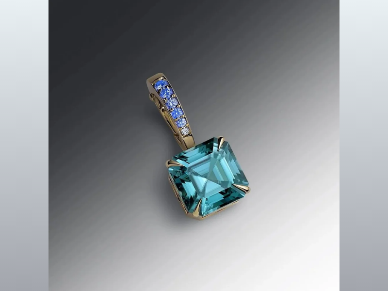 One-of-a-Kind Pavé Diamond Large Hinged Bail Charm with a Asher-Cut Blue Zircon (Image Credit: GemologyGeek official website)