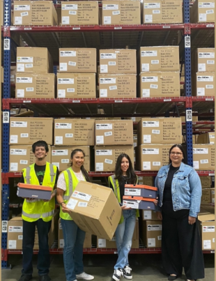 Barrett’s team celebrates the successful go-live of STOKE Shoes in Montebello, California (Image Courtesy: PRNewswire)