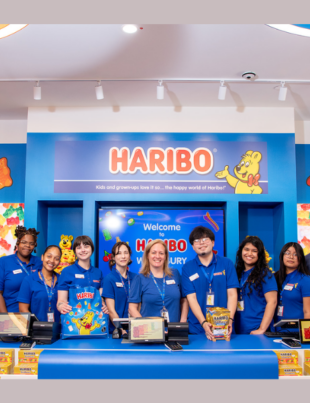Pictured from left Seth Klugherz, VP of Marketing, HARIBO of America; Julie Mangler, Woodbury Shop Manager; and Jon Hughes, President & CEO, HARIBO of America. (Image Courtesy: PRNewswire)