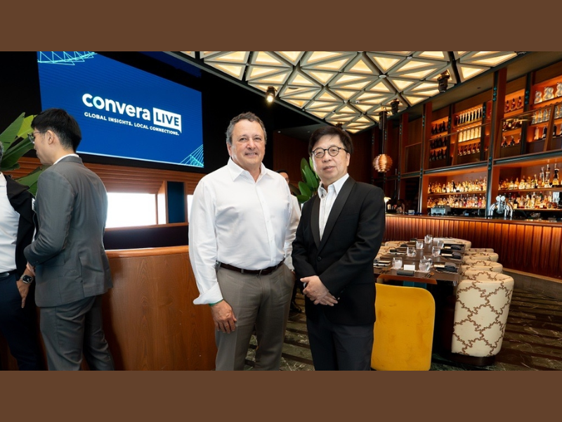 Patrick Gauthier, Group CEO of Convera with CEO of Just LogIn, Kwa Kim Chiong (Image Courtesy: PRNewswire)